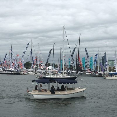 a boat is docked next to a body of water