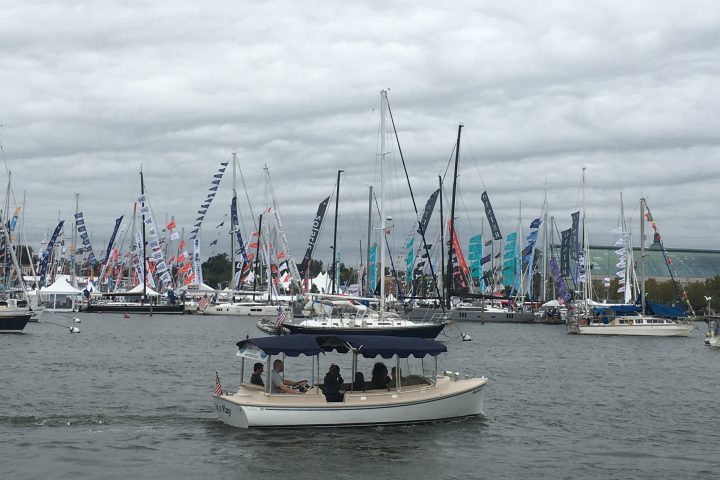 a boat is docked next to a body of water