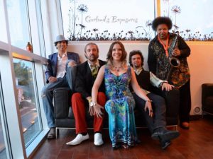 a group of people standing in a room