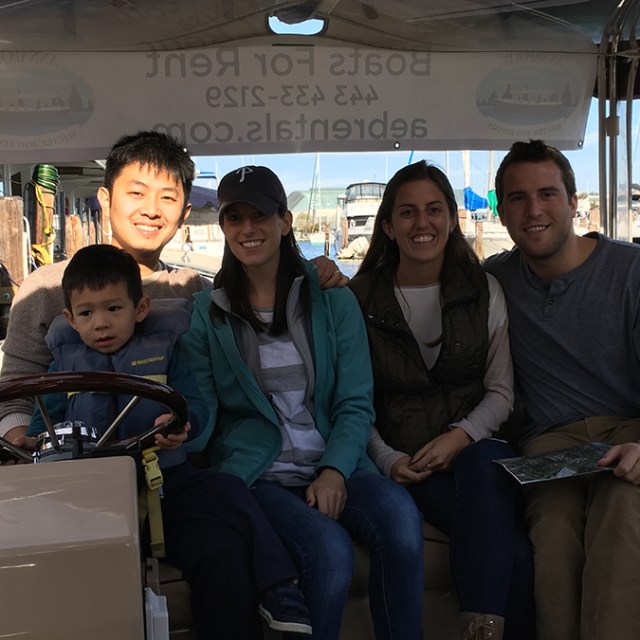 a group of people sitting posing for the camera