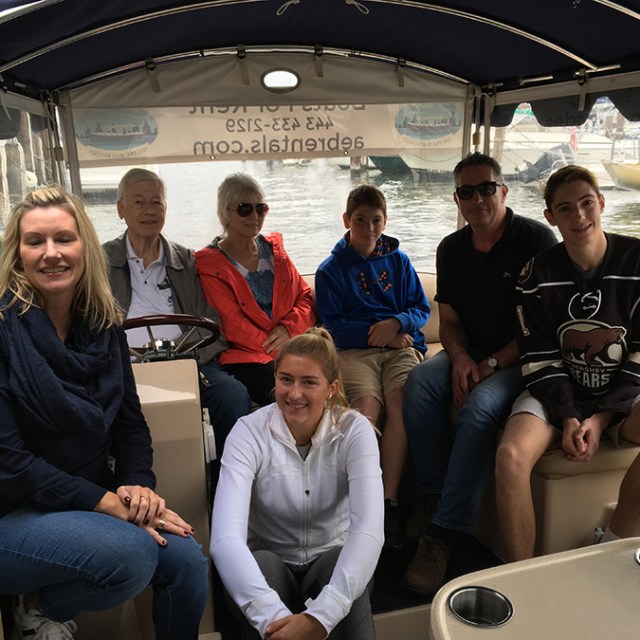 a group of people sitting posing for the camera